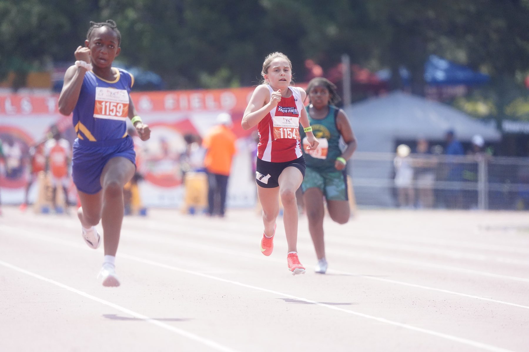 Tight finish line dash between competitors
