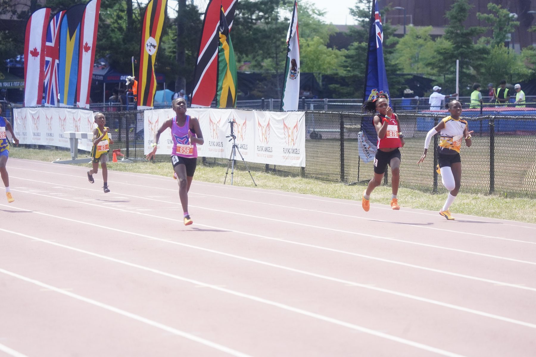 Athlete crossing the finish in full stride